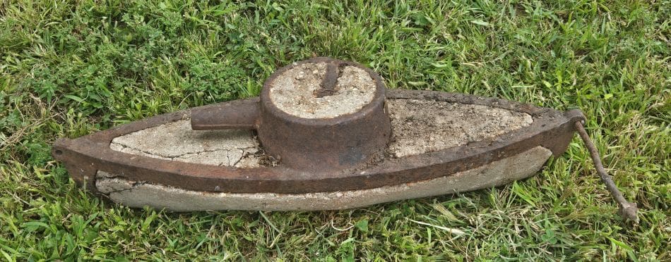 Battleship cast iron & concrete windmill weight, featured in the Day 1 auction.