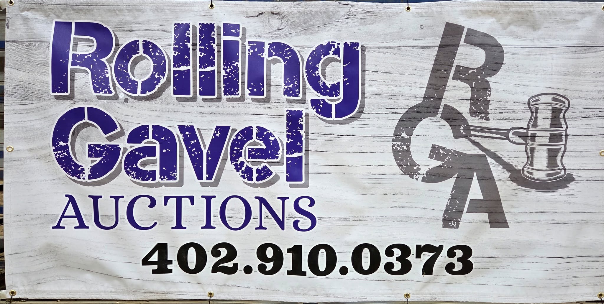Rolling Gavel Auctions banner with phone number